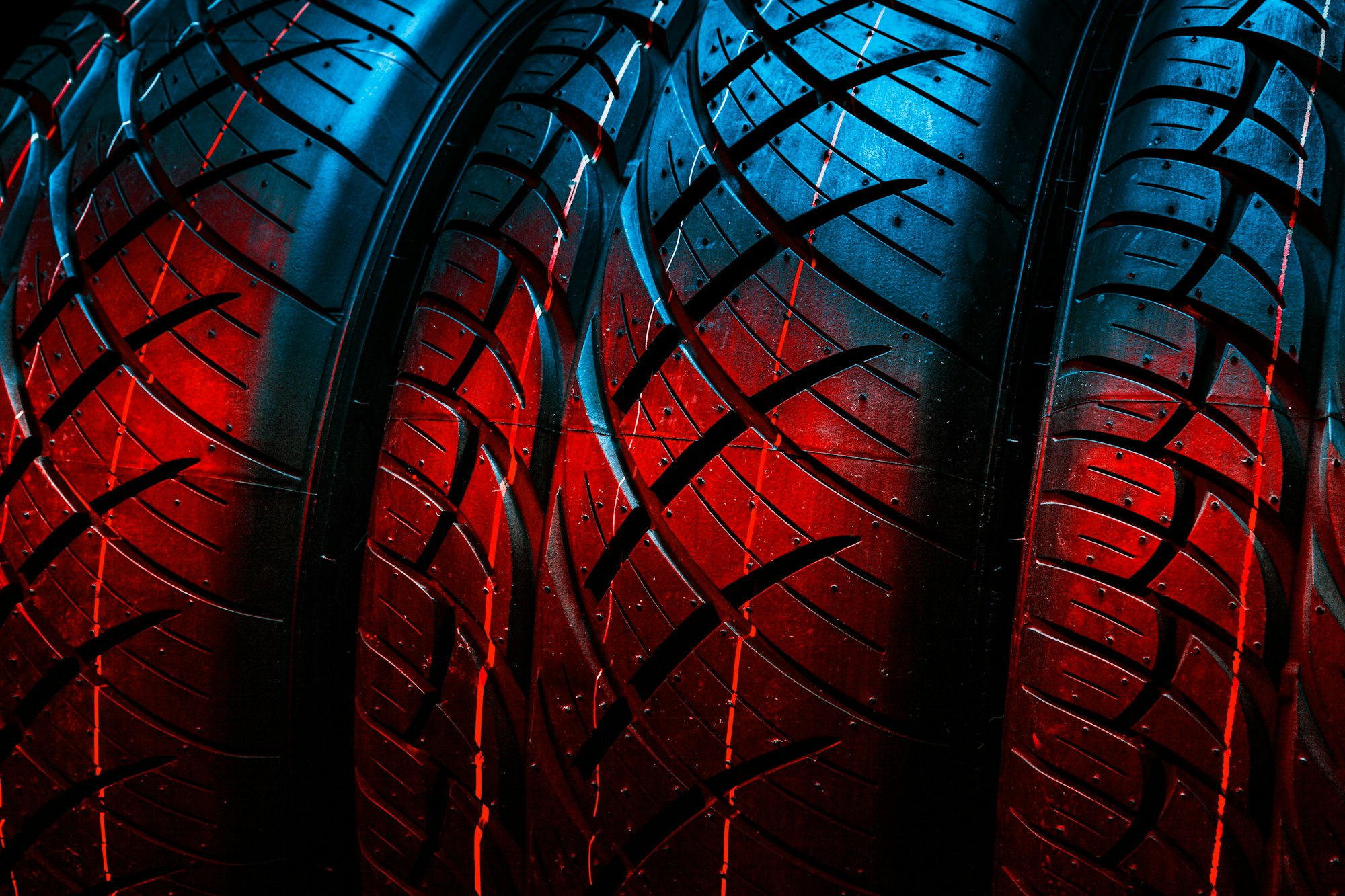 New tyres background. Car tyres close up